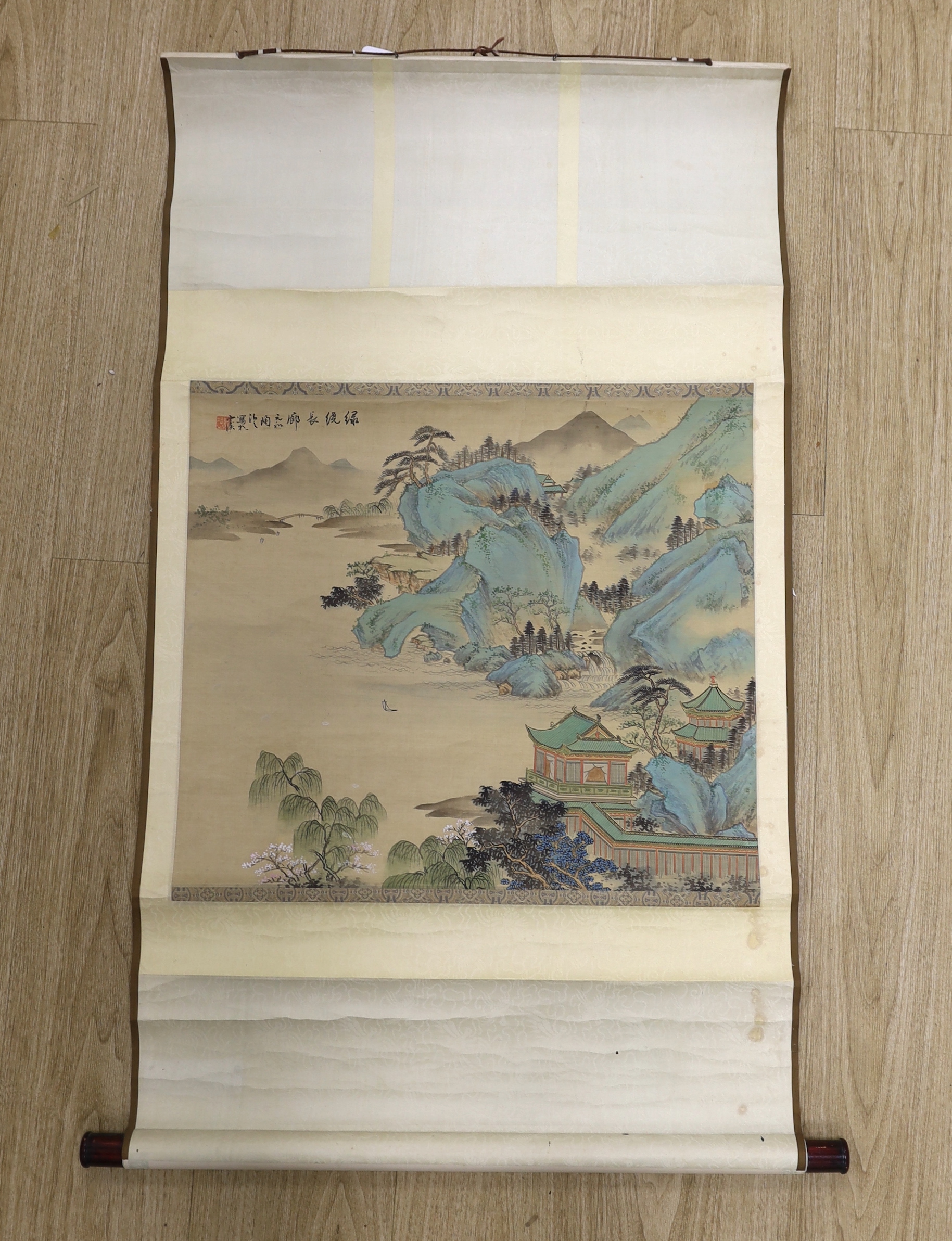 A Chinese watercolour on silk scroll painting, mountainous landscape with pagodas